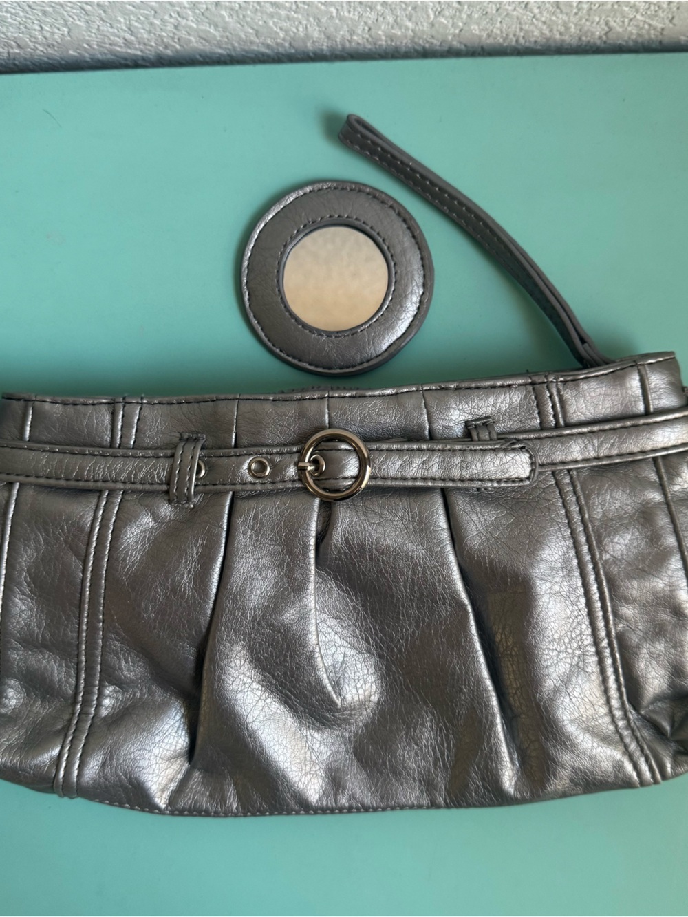 Metallic Silver Interior Wristlet clutch bag with mirror Neiman Marcux